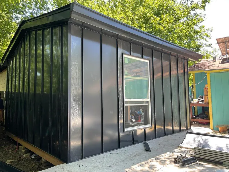 Black standing seam metal wall panels for Roof Inspection in Cloverleaf